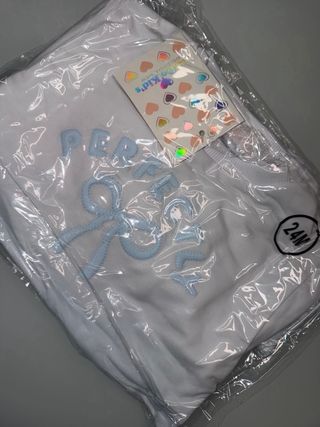 Completo bimba bianco con fiocco azzurro