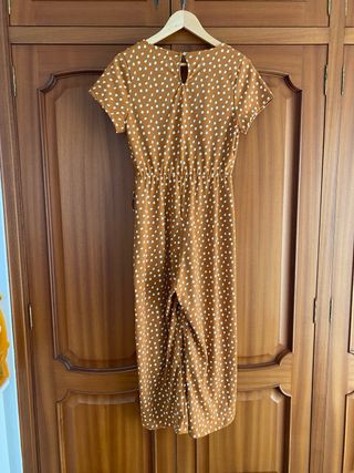 Mono lunares naranja y blanco