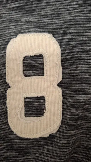 Polo Tommy Hilfiger manga larga gris