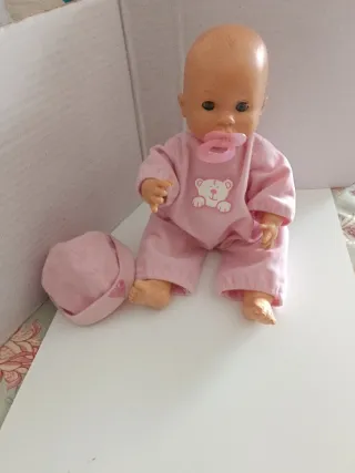 Muñeca bebé, ropita rosa con chupete, 32 cm.