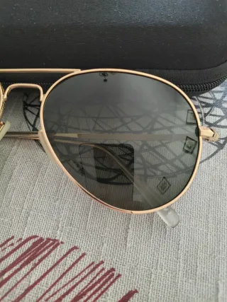 Gafas de sol polarizadas doradas