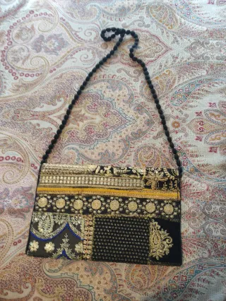 Bolso de fiesta sobre dorado y negro