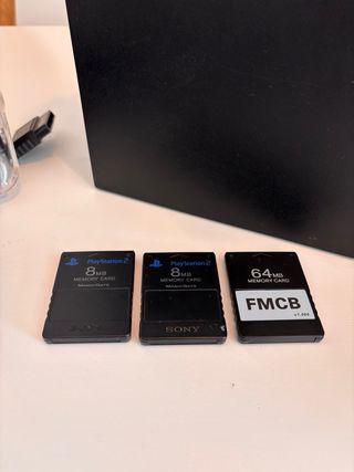 Consola PS2 con Mandos, Microfonos y Juegos