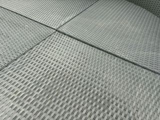 Divano rotondo da esterno beige e nero