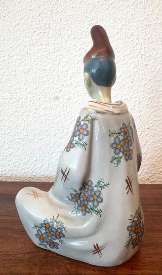 Figura en porcelana china cabeza basculante