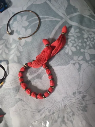 Lote de pulseras y reloj y acesorios movil