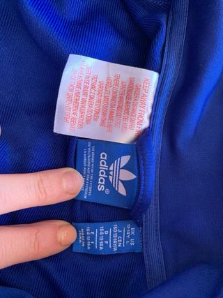 Chaqueta Adidas azul con rayas negras