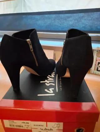 Botines negros de ante de tacón