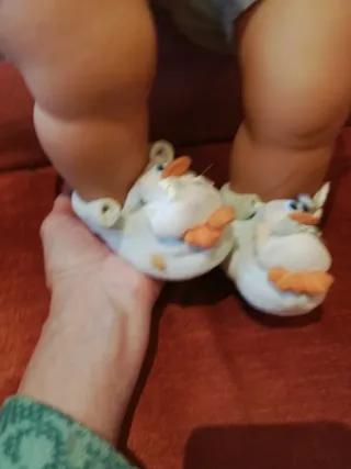 Bambola Bebe' con vestitino azzurro