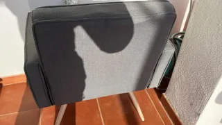 Butaca tapizada gris