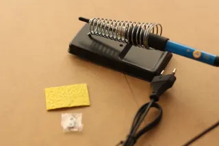 Soporte para soldador eléctrico.