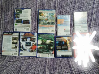 Lote carcassas y manuales PS2, PS4 e Switch