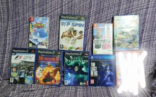 Lote carcassas y manuales PS2, PS4 e Switch