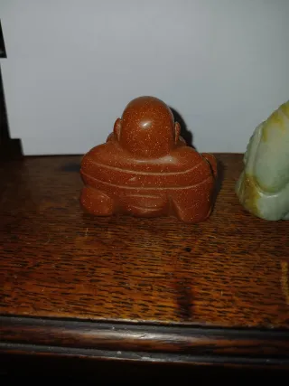 Statuette Buddha sorridente in pietra e marmo