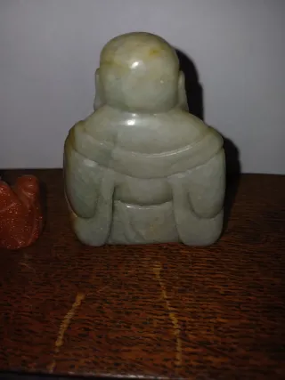 Statuette Buddha sorridente in pietra e marmo