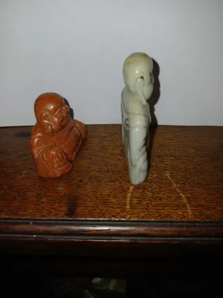 Statuette Buddha sorridente in pietra e marmo