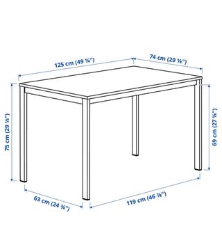 Mesa de comedor blanca de madera