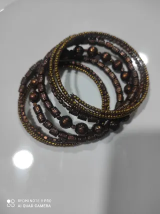 Conjunto de 3 pulseras doradas y amarillas