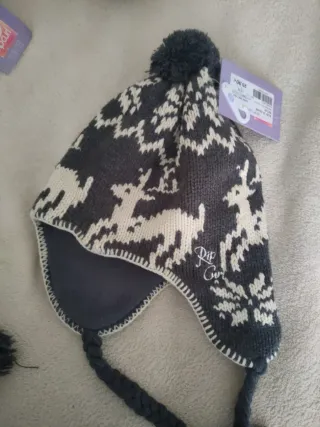Gorro Rip Curl gris y blanco con pompón
