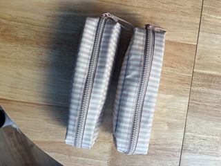 Estuche impermeable beige y rosa