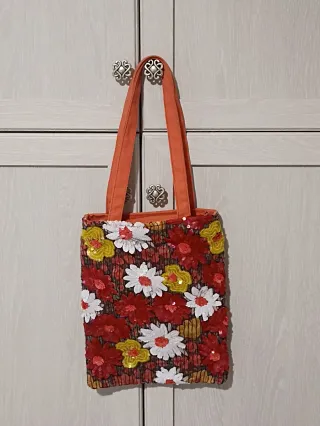 Borsa Only con paillettes floreali. Mai indossata