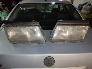 Faróis Originais Hella Passat B5