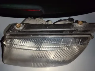 Faróis Originais Hella Passat B5