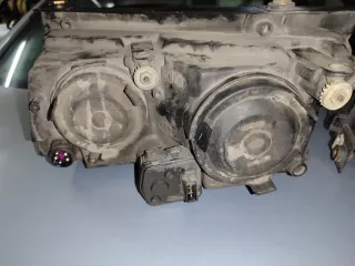 Faróis Originais Hella Passat B5