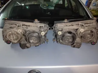 Faróis Originais Hella Passat B5