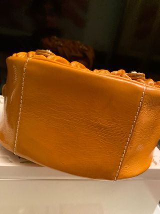 Bolso Tous mostaza y dorado