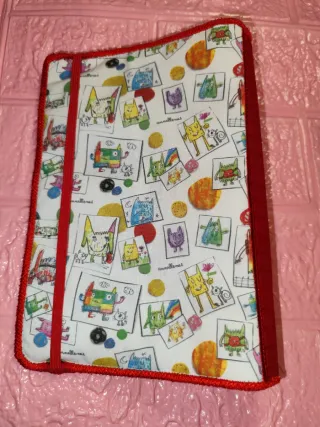 Portadocumentos bebé monstruo de colores