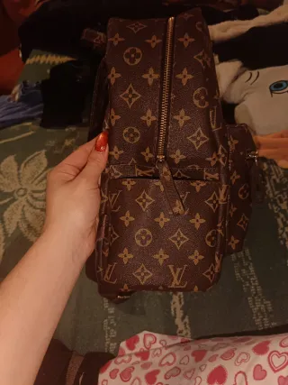 Mochila Louis Vuitton Marrón y Dorada