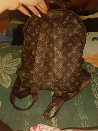 Mochila Louis Vuitton Marrón y Dorada