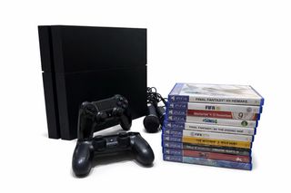 PS4 (PlayStation 4) + 10 Juegos + 2 Mandos