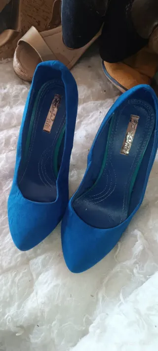 Sandalias doradas tacón alto