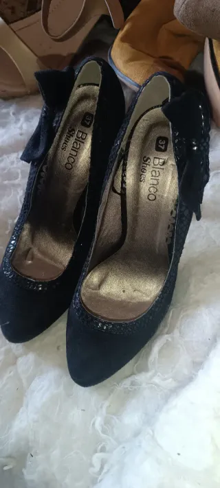 Sandalias doradas tacón alto