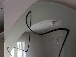 Espejo asimétrico moderno