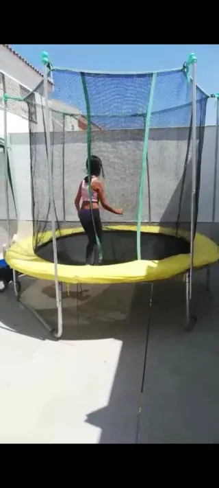 Cama elástica infantil con red de seguridad