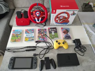 Nintendo Switch + Mario Kart + Juegos