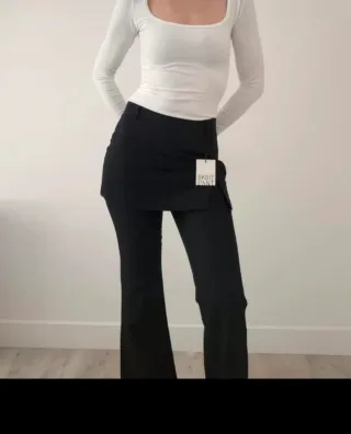 Pantalón campana con falda Stradivarius T.XS