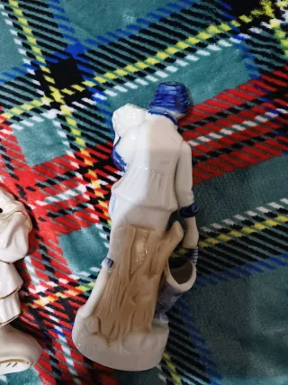 Statuette in ceramica dorata