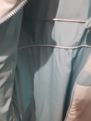 Plumifero Nike reversible azul y turquesa