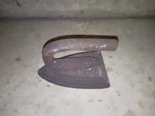 Plancha antigua de hierro