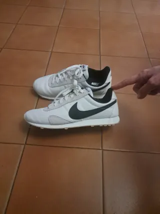 Zapatillas Nike lona blancas y negras