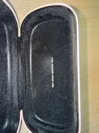 Gafas de sol Tous negras y doradas