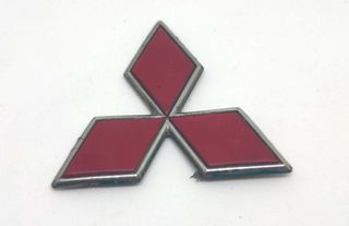 Simbolo Mitsubishi frente traseira 48mm usado orig