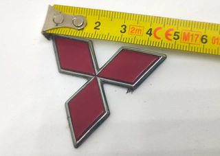 Simbolo Mitsubishi frente traseira 48mm usado orig