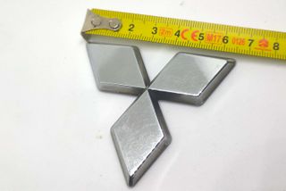 Simbolo Mitsubishi frente traseira 65mm usado orig