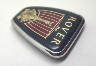 Simbolo Rover 68x55mm original usado mala frente