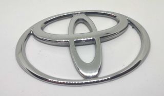 Simbolo Toyota 125x85mm frente traseira usado orig